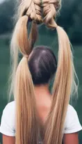 Woman with hair tied in high pigtails, Beautiful